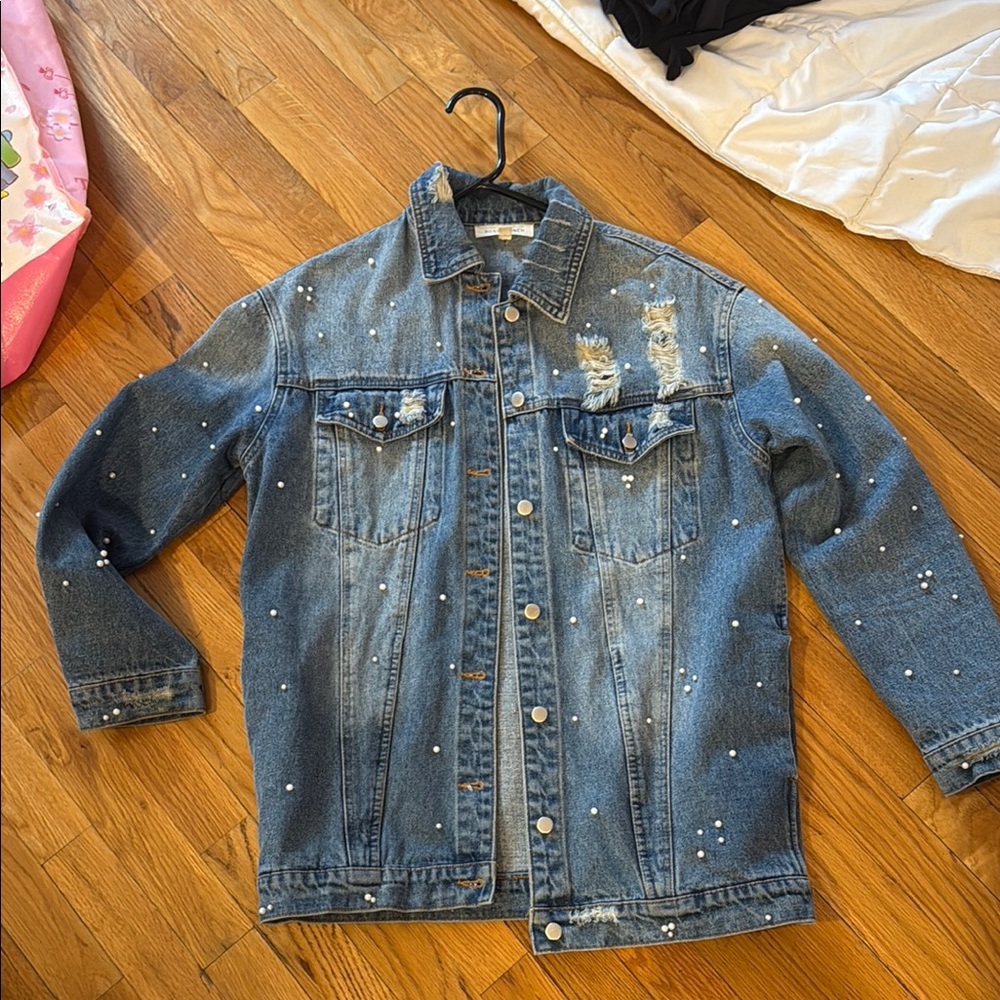 Distressed Denim Jacket with Paint Splatter
